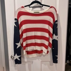 Red white and blue light sweater. Size unknown but could fit XS or S.